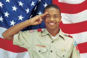 Scouts BSA member in uniform saluting