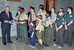 Scouters in uniform at service